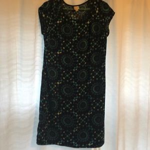 Black dress with blue, white, and teal pattern